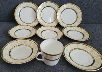 A cup and saucers from the Elizabethan Cavendish English porcelain set