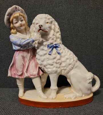 Staffordshire Figurine "Staffordshire dog and girl"
