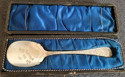 Antique silver-plated spoon with handmade engraving.