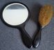 A beautiful set of mirror and combs made of ebony, with sterling silver decoration