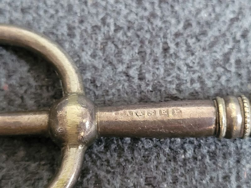 Antique serving fork on a stand
