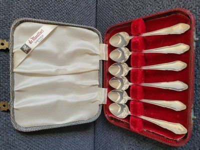 A set of silver-plated De Montfort coffee spoons