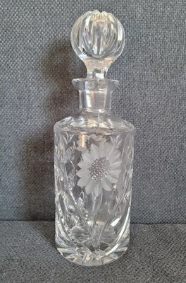 Vintage crystal decanter with engraving