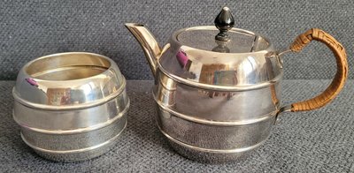 Silver-plated teapot and sugar bowl of the late 19th century