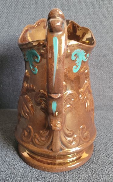 Antique ceramic jug of the Victorian period