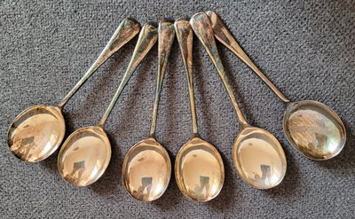 A set of English silver-plated soup spoons