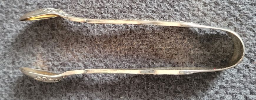 Antique silver-plated spoon and sugar tongs