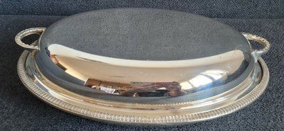 Classic English silver-plated Marmite oval shape.