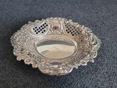 Vintage sterling silver trinket tray decorated with beautiful coinage
