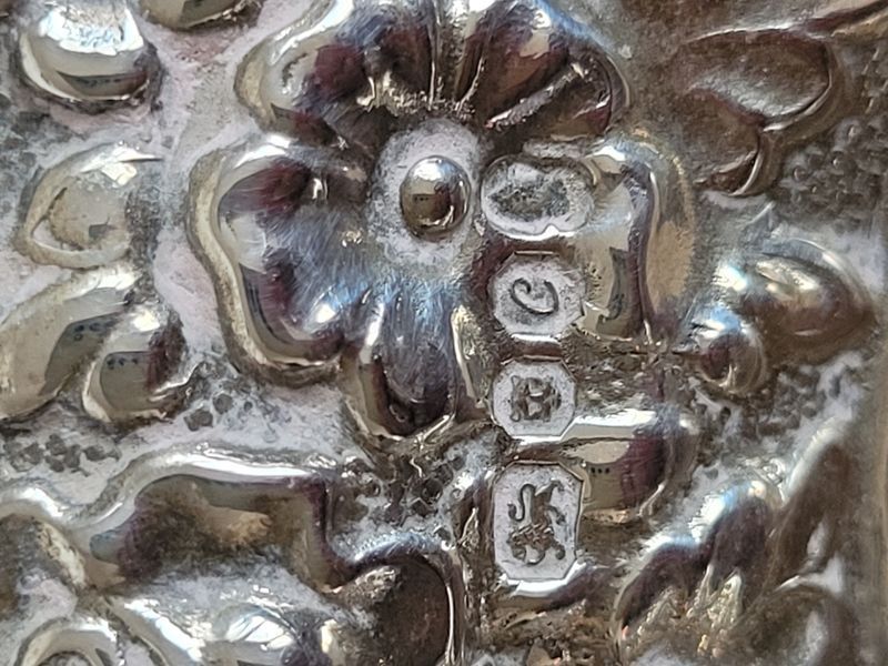 Vintage sterling silver trinket tray decorated with beautiful coinage