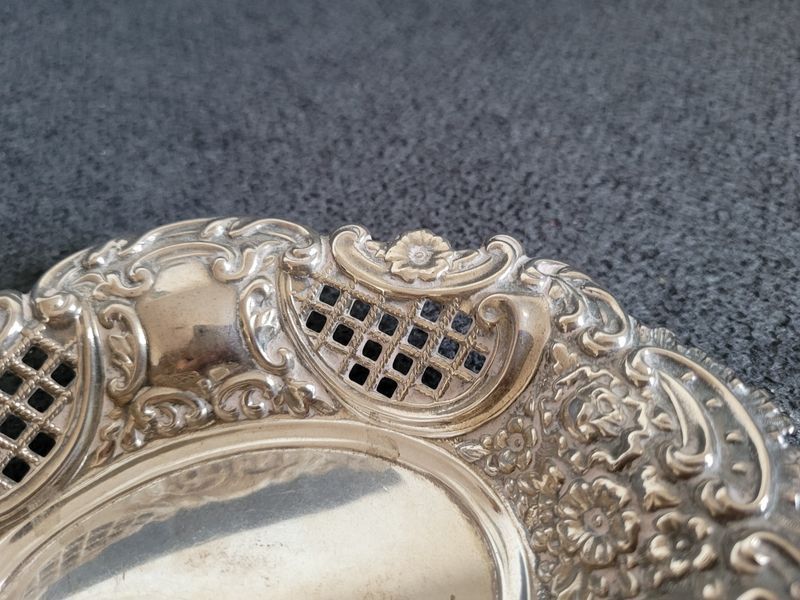 Vintage sterling silver trinket tray decorated with beautiful coinage