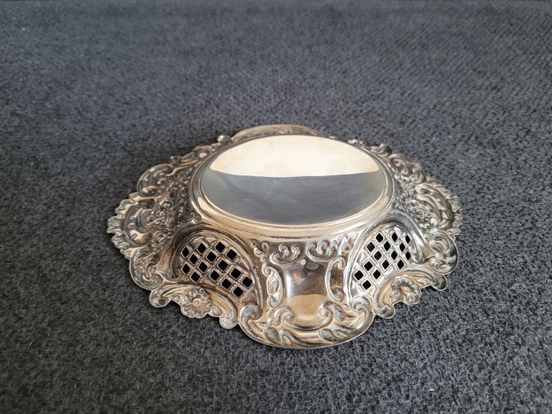 Vintage sterling silver trinket tray decorated with beautiful coinage