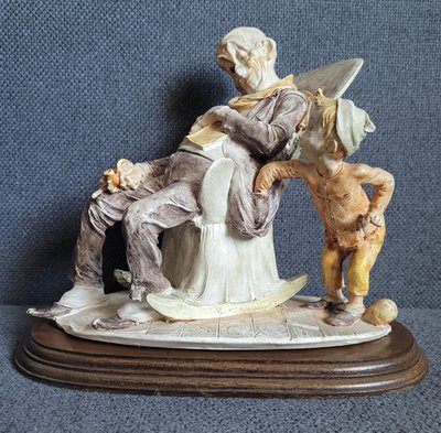 Capodimonte Figurine "The boy steals from the pockets of old people"