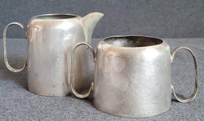 Antique silver plated service milk jug and sugar bowl