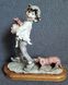 Giuseppe Armani's Capodimonte Figurine"Boy W/ Dog & Puppies"