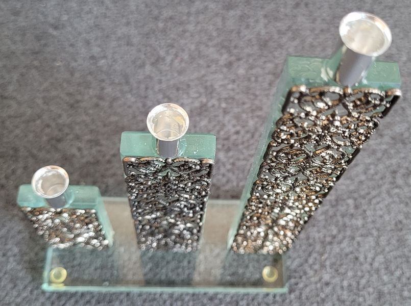Vintage glass decor with metal filigree.