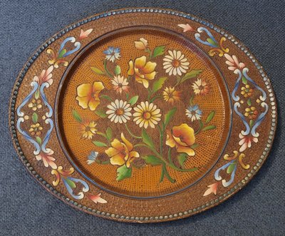 Vintage wooden decorative tray with carvings and hand-made pattern.