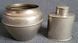 Vintage white metal sugar bowl and tea storage bottle.