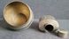 Vintage white metal sugar bowl and tea storage bottle.