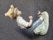 NAO by Lladro Fi&uacute; madarakkal porcel&aacute;n figura 1988