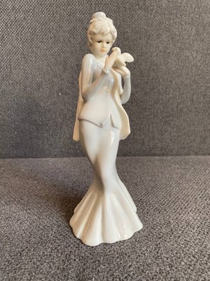 Porcelain Figurine "Girl With a Bird"