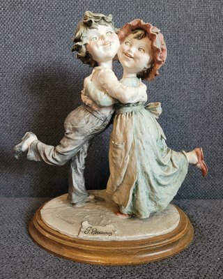 Giuseppe Armani's Capodimonte Figurine "Embracing boy and girl"