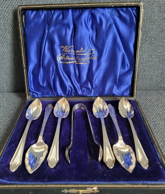 Vintage set of silver-plated spoons (6 pieces) and sugar tongs.