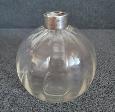 A large antique crystal perfume bottle