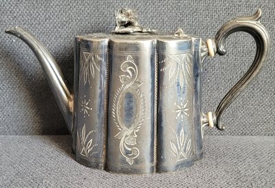 Beautiful antique silver plated teapot with handmade engraving