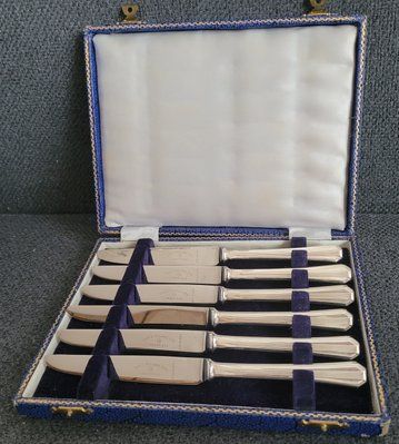 A set of vintage snack knives.