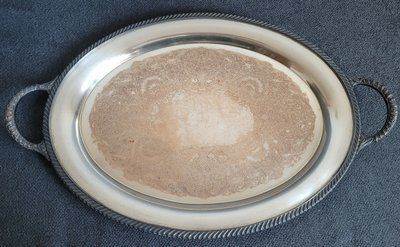 A beautiful heavy oval silver-plated tray from the early 20th century
