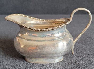 Antique silver-plated gravy boat. Made in England Sheffield.