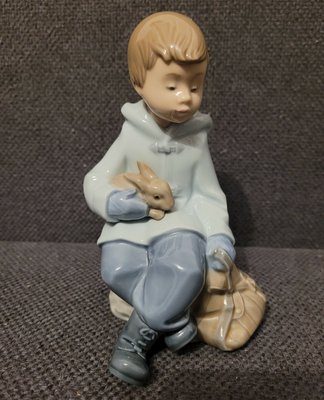 Nao By Lladro "a boy holding a rabbit" 1037