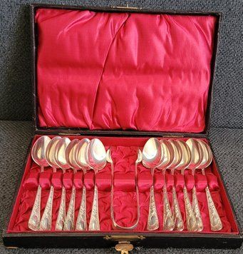 Vintage set of silver-plated tea spoons (12 pieces) and sugar tongs