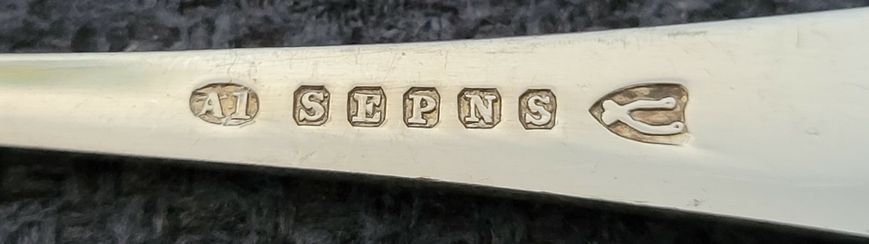 Vintage set of silver-plated tea spoons (12 pieces) and sugar tongs