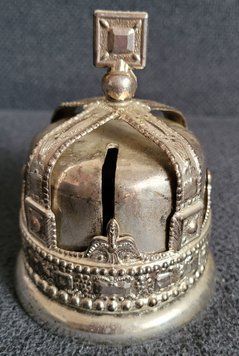 Vintage piggy bank in the shape of a Coronation Crown