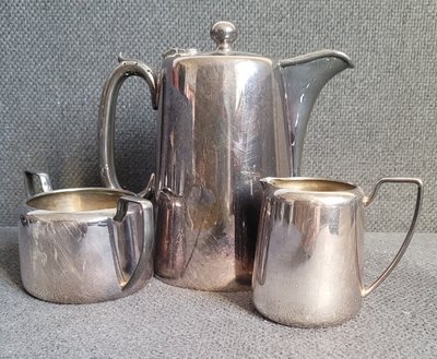 Antique English silver-plated set of teapot, sugar bowl and creamer