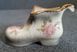 A pair of Mayfayre porcelain shoes