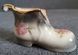 A pair of Mayfayre porcelain shoes