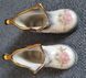 A pair of Mayfayre porcelain shoes