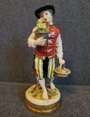 Volkstedt Thuringia figurine "А male gardener with basket of flowers"