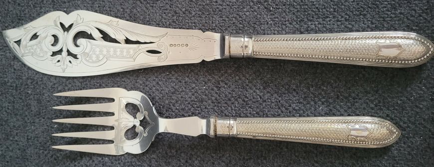 Antique serving set with silver-plated fork and knife