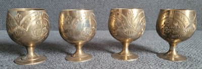 A set of vintage silver-plated glasses