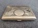 Vintage cigarette case  10 dollars with an engraving of King George VI