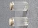 Two antique glass vials with silver lids from 1867 and 1900