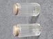 Two antique glass vials with silver lids from 1867 and 1900