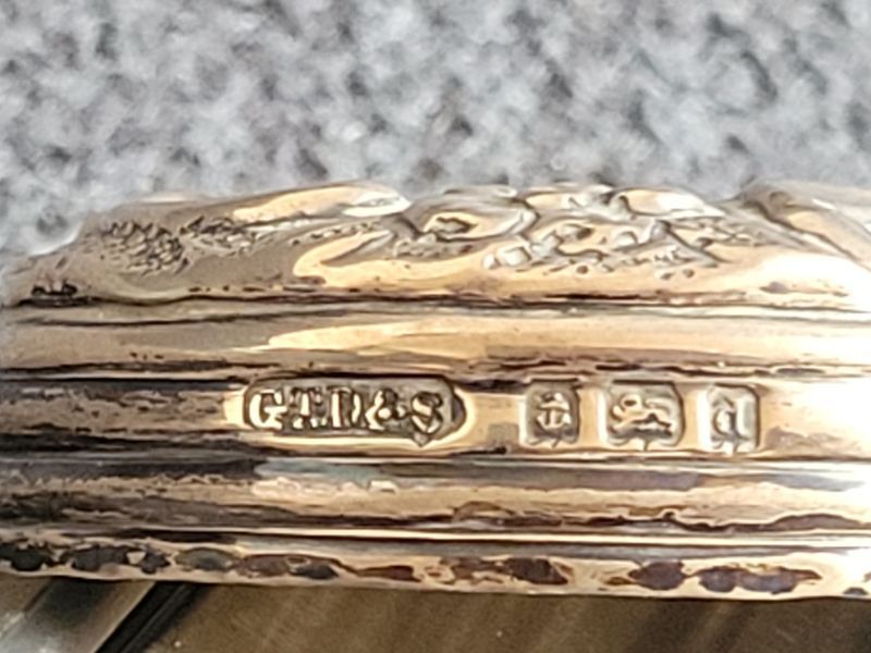 Two antique glass vials with silver lids from 1867 and 1900
