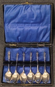 Vintage silver-plated apostolic spoons.