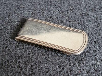The money clip is sterling silver.