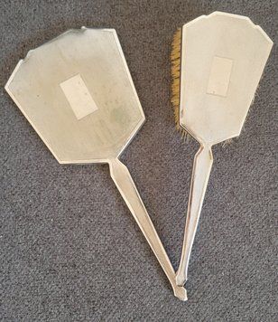 Vintage mirror and hair brush.